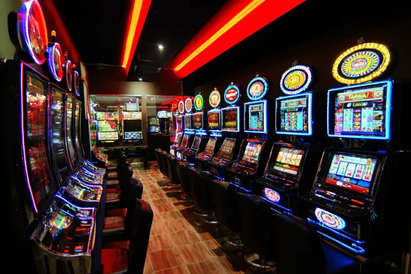 A confident dealer surrounded by casino chips inviting players to access their 777ZK account, reflecting quick and easy login options.